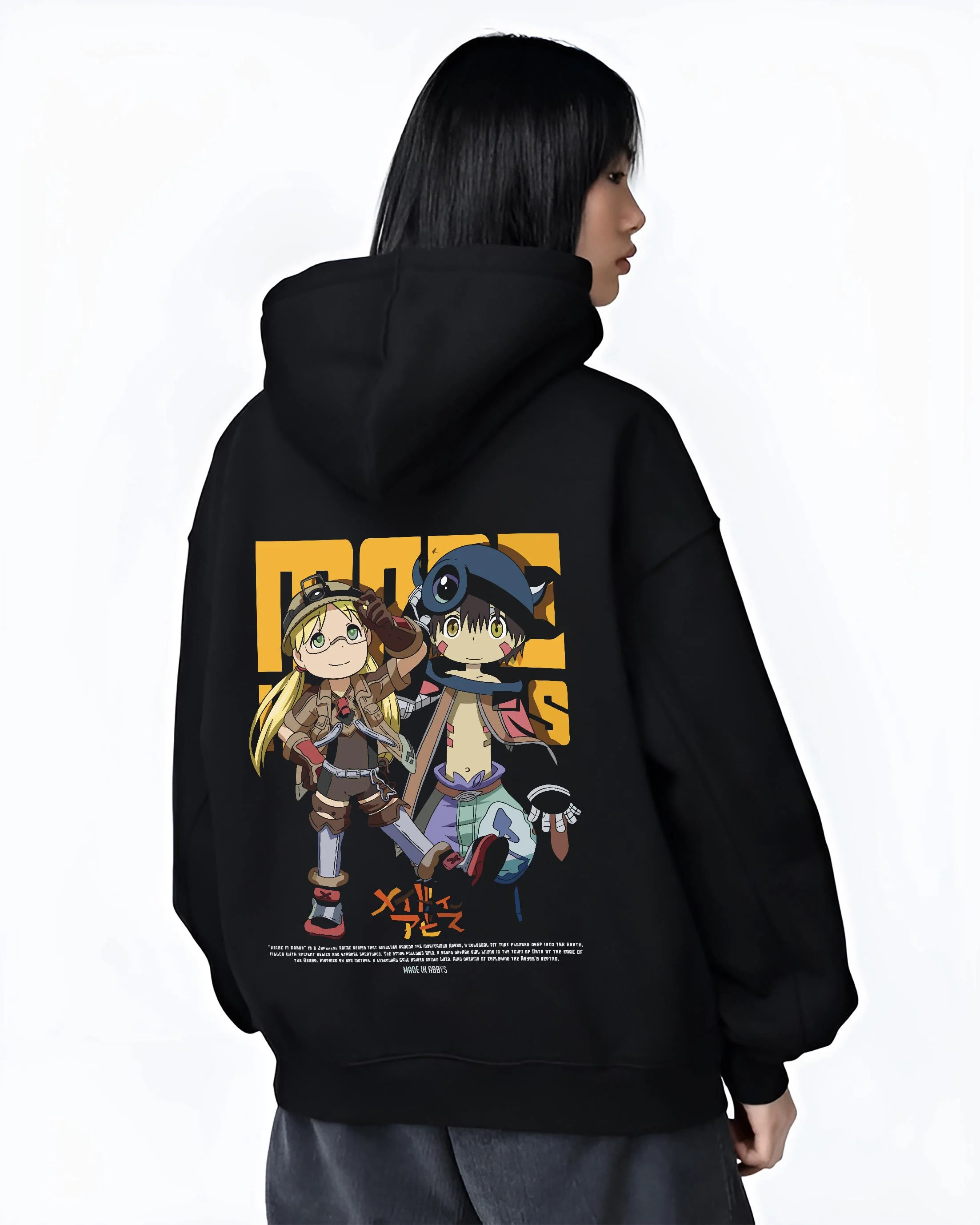 Black hoodie worn by female model, back view with Made in Abyss Explorer Hoodie Cave Adventure Jumper graphic bold anime graphic.