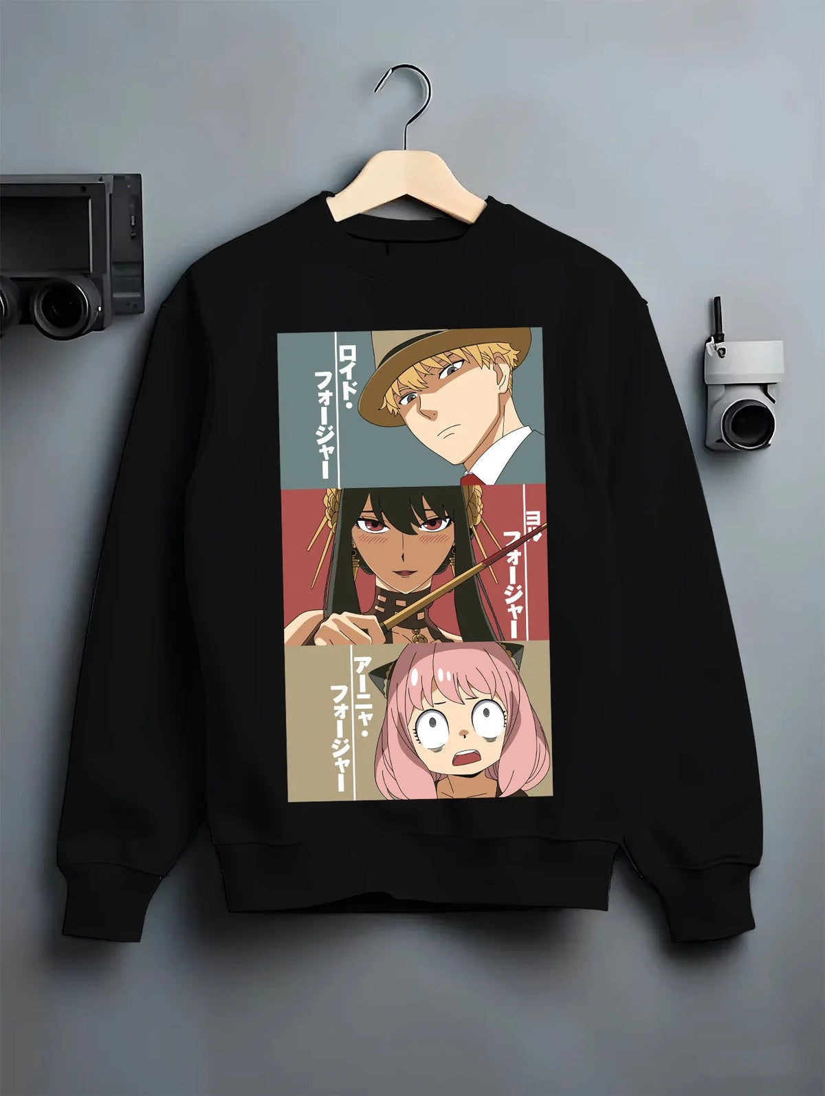 Black crewneck sweatshirt on hanger showing Loid Forger, Yor Forger and Anya Forger from Spy x Family: three-panel portrait