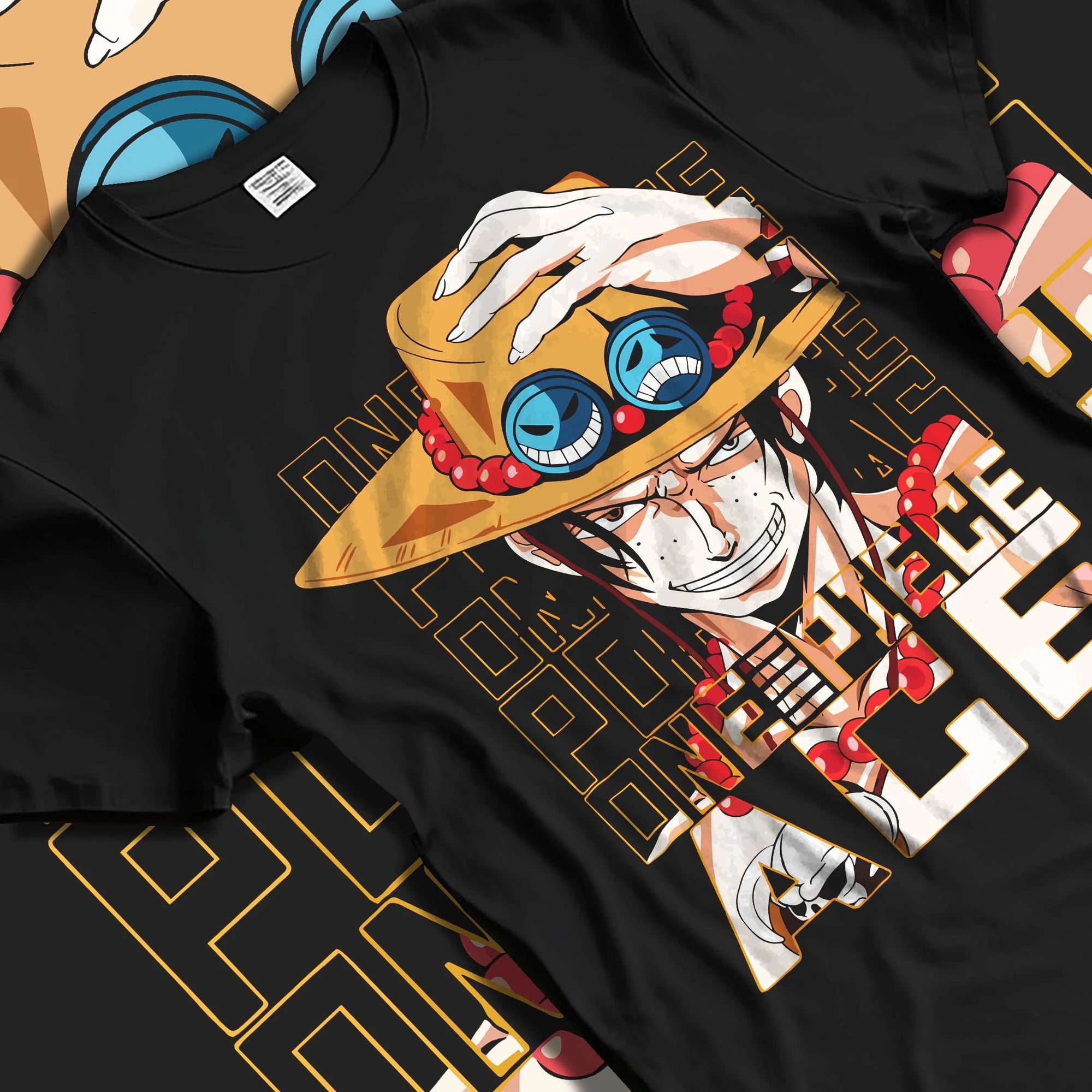 Black T-shirt laid flat with natural folds with Portgas D Ace Hoodie One Piece Freckled Pirate Grin graphic streetwear graphic.