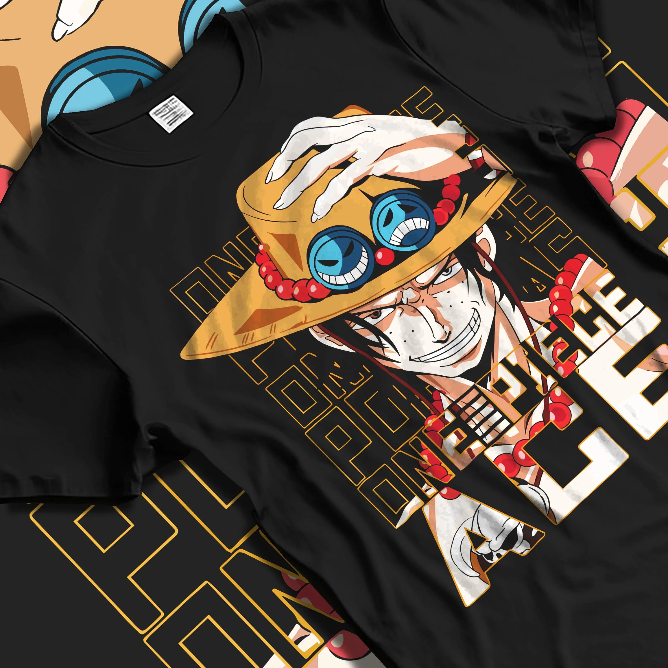 Black T-shirt laid flat with natural folds with Portgas D Ace Hoodie One Piece Freckled Pirate Grin graphic streetwear graphic.