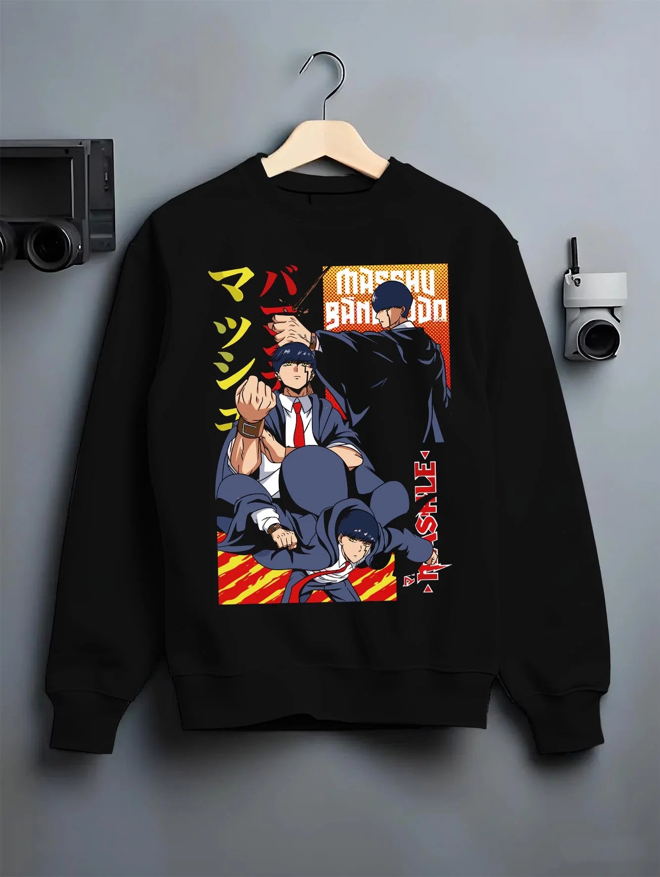 Black crewneck sweatshirt on hanger with Mashle Magic Muscles Hoodie Action Pose Anime Jumper graphic premium wear.