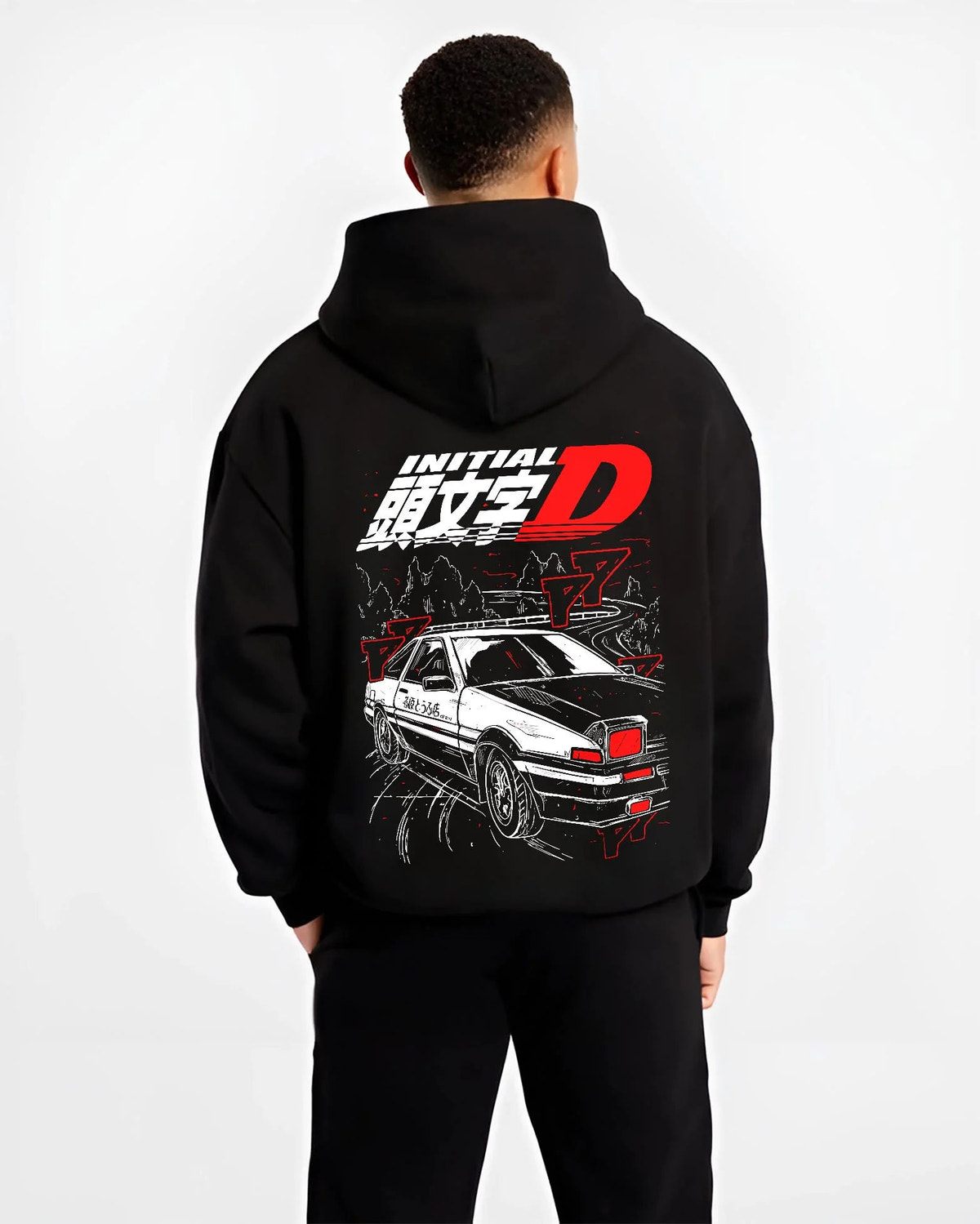 Black hoodie worn by male model from the back featuring Takumi Fujiwara AE86 Initial D drift racing artwork.