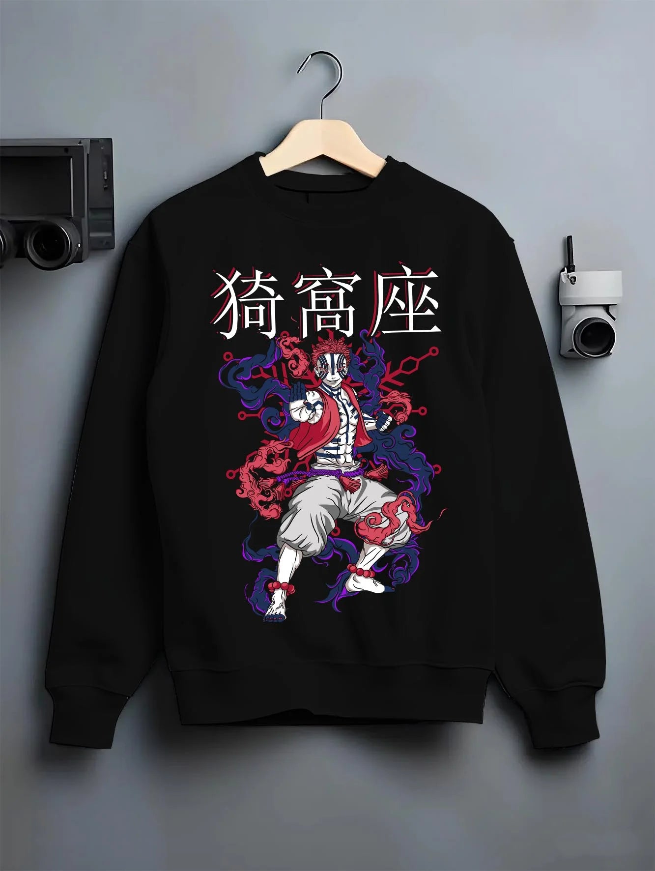 Black crewneck sweatshirt on hanger with Akaza Demon Slayer Hoodie Upper Moon Dark Battle Pose graphic streetwear graphic.