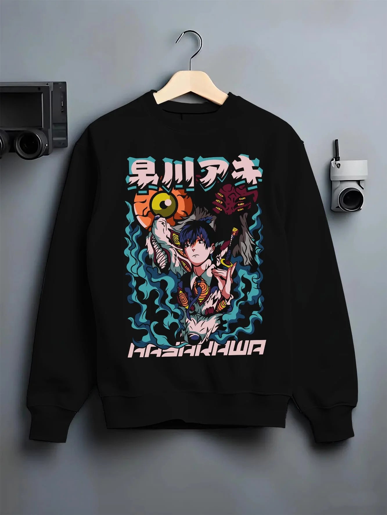 Black crewneck sweatshirt on hanger with Aki Hayakawa Hoodie Chainsaw Man Devil Hunter Katana graphic premium wear.