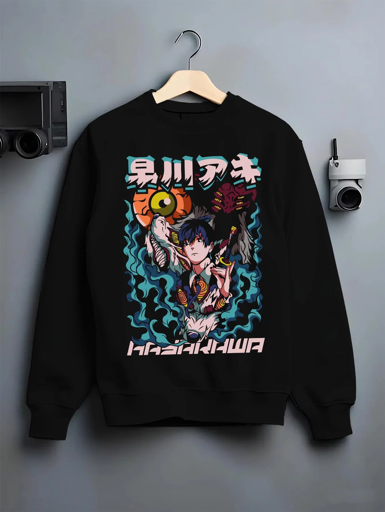 Black crewneck sweatshirt on hanger with Aki Hayakawa Hoodie Chainsaw Man Devil Hunter Katana graphic premium wear.
