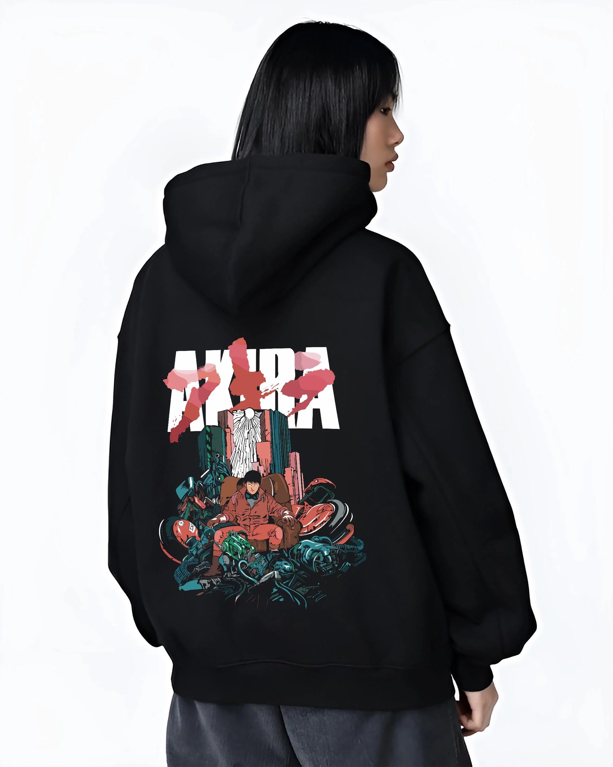 Black hoodie worn by female model, back view with Akira Neo Tokyo Hoodie Capsule Motorcycle Retro Panel graphic premium wear.