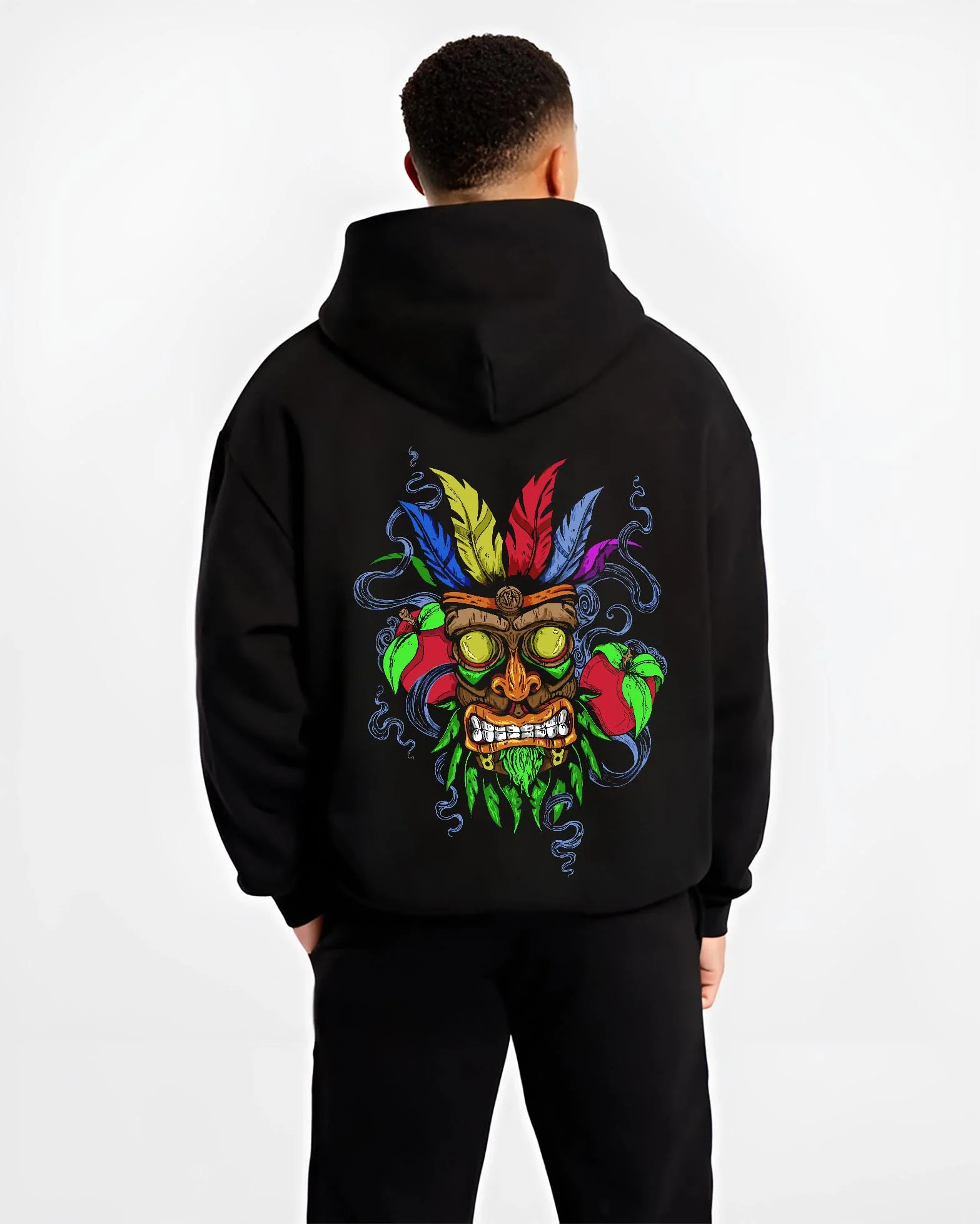 Black hoodie worn by male model, back view with Crash Bandicoot Aku Aku Hoodie Retro Gaming Classic graphic bold anime graphic.