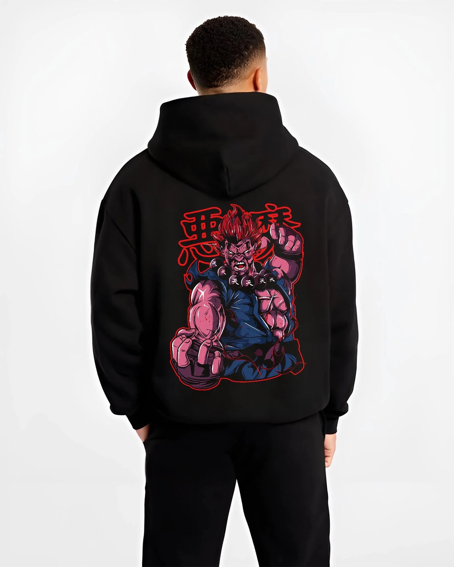 Black hoodie worn by male model, back view with Akuma Raging Demon Hoodie Street Fighter Dark Energy graphic Akuma anime design.