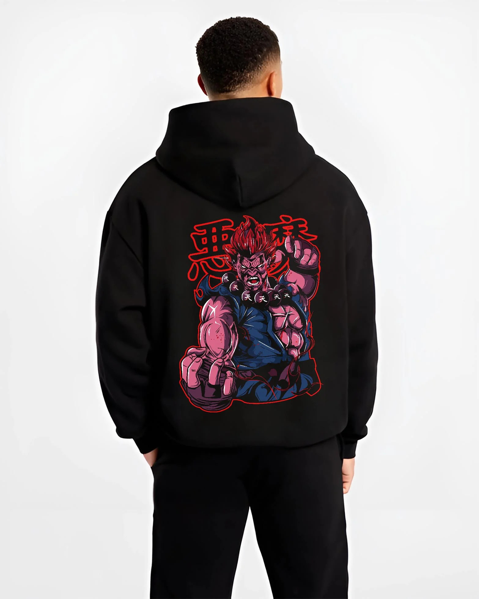 Black hoodie worn by male model, back view with Akuma Raging Demon Hoodie Street Fighter Dark Energy graphic Akuma anime design.