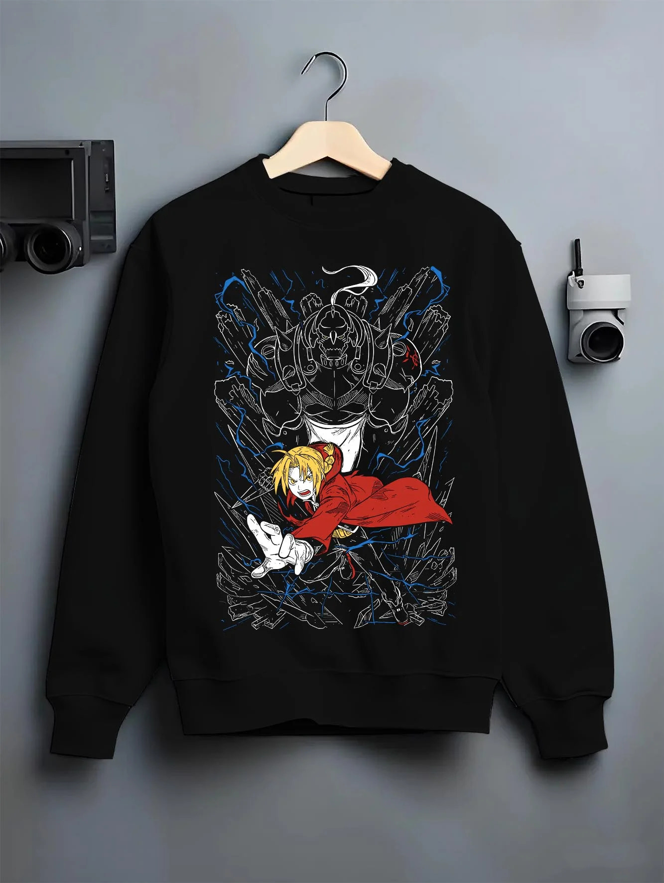 Black crewneck sweatshirt on hanger with Elric Brothers Hoodie Fullmetal Alchemist Battle Bond graphic bold anime graphic.