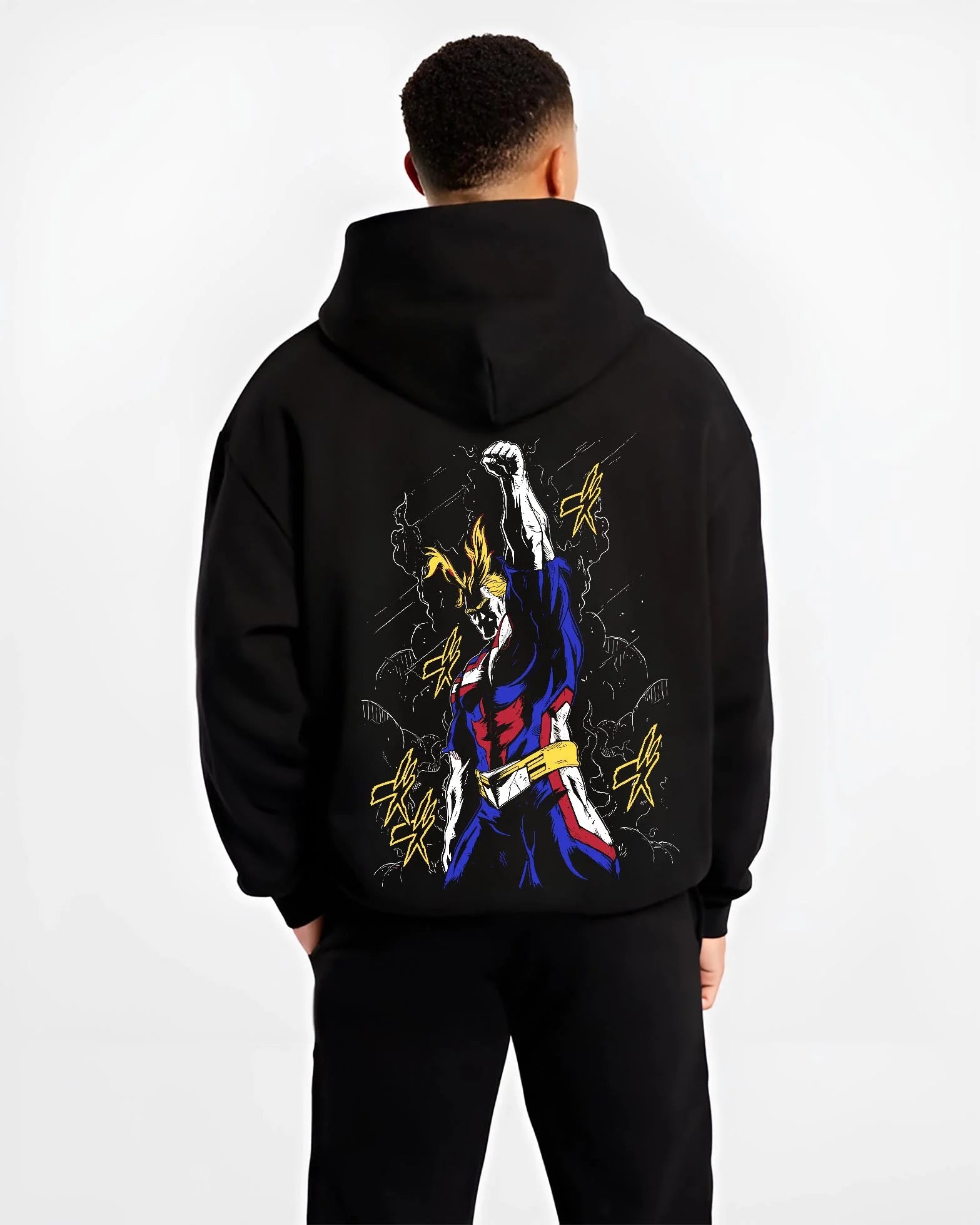 Black hoodie worn by male model, back view with All Might Power Hoodie My Hero Academia Lightning Pose graphic bold anime graphic.