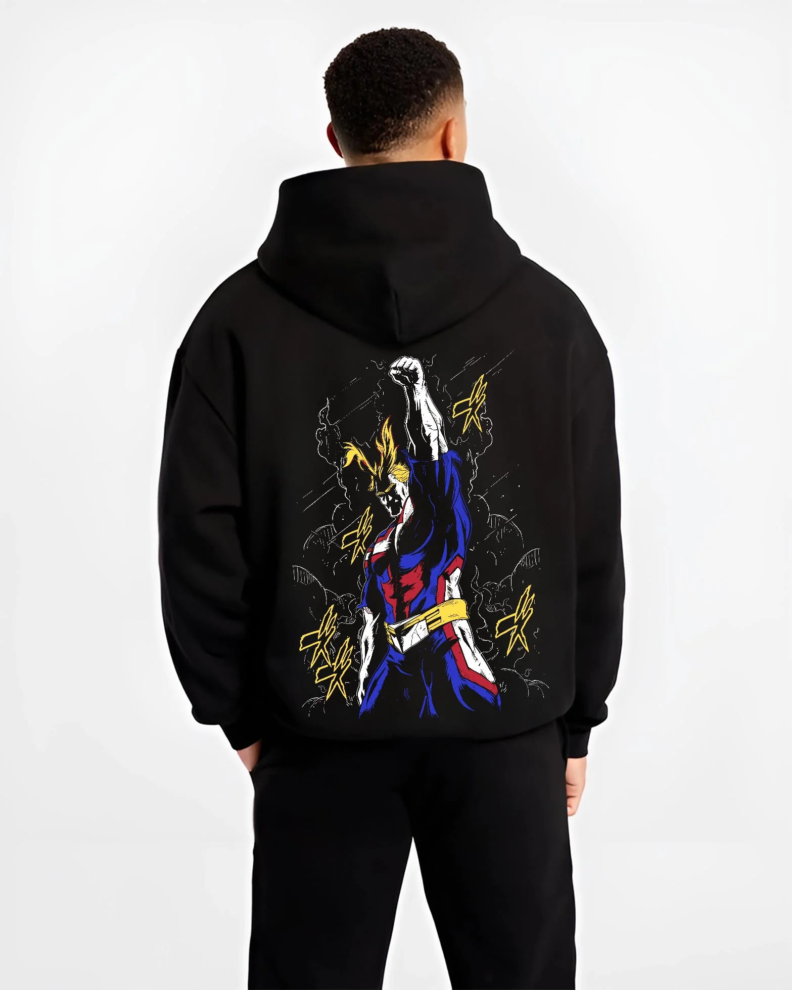 Black hoodie worn by male model, back view with All Might Power Hoodie My Hero Academia Lightning Pose graphic bold anime graphic.