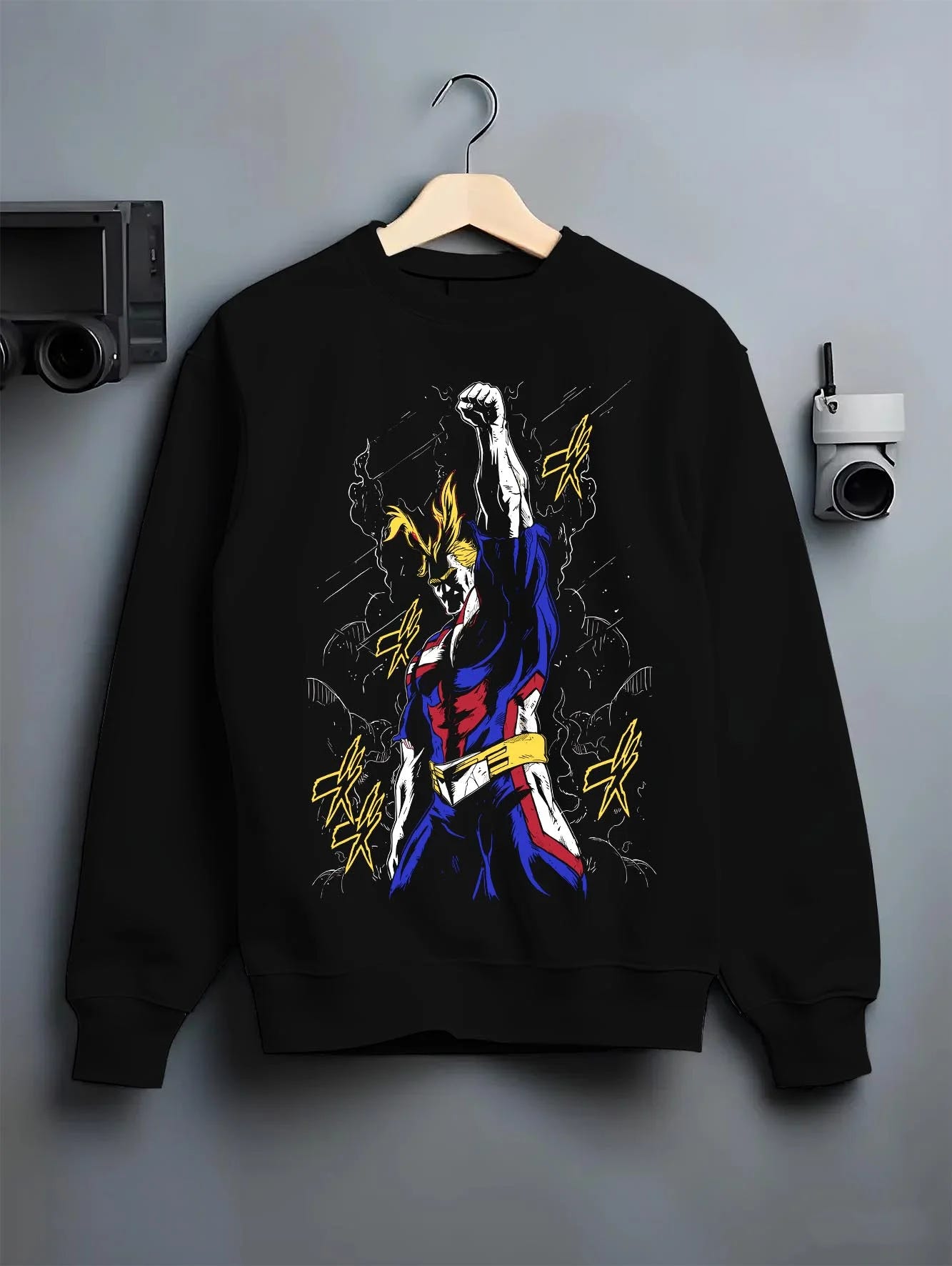 Black crewneck sweatshirt on hanger with All Might Power Hoodie My Hero Academia Lightning Pose graphic bold anime graphic.
