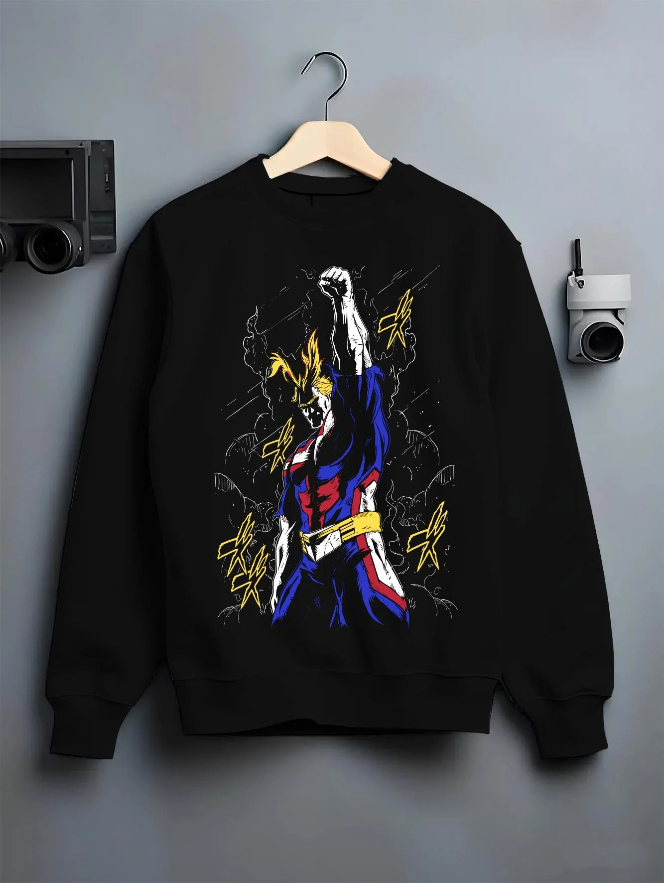 Black crewneck sweatshirt on hanger with All Might Power Hoodie My Hero Academia Lightning Pose graphic bold anime graphic.
