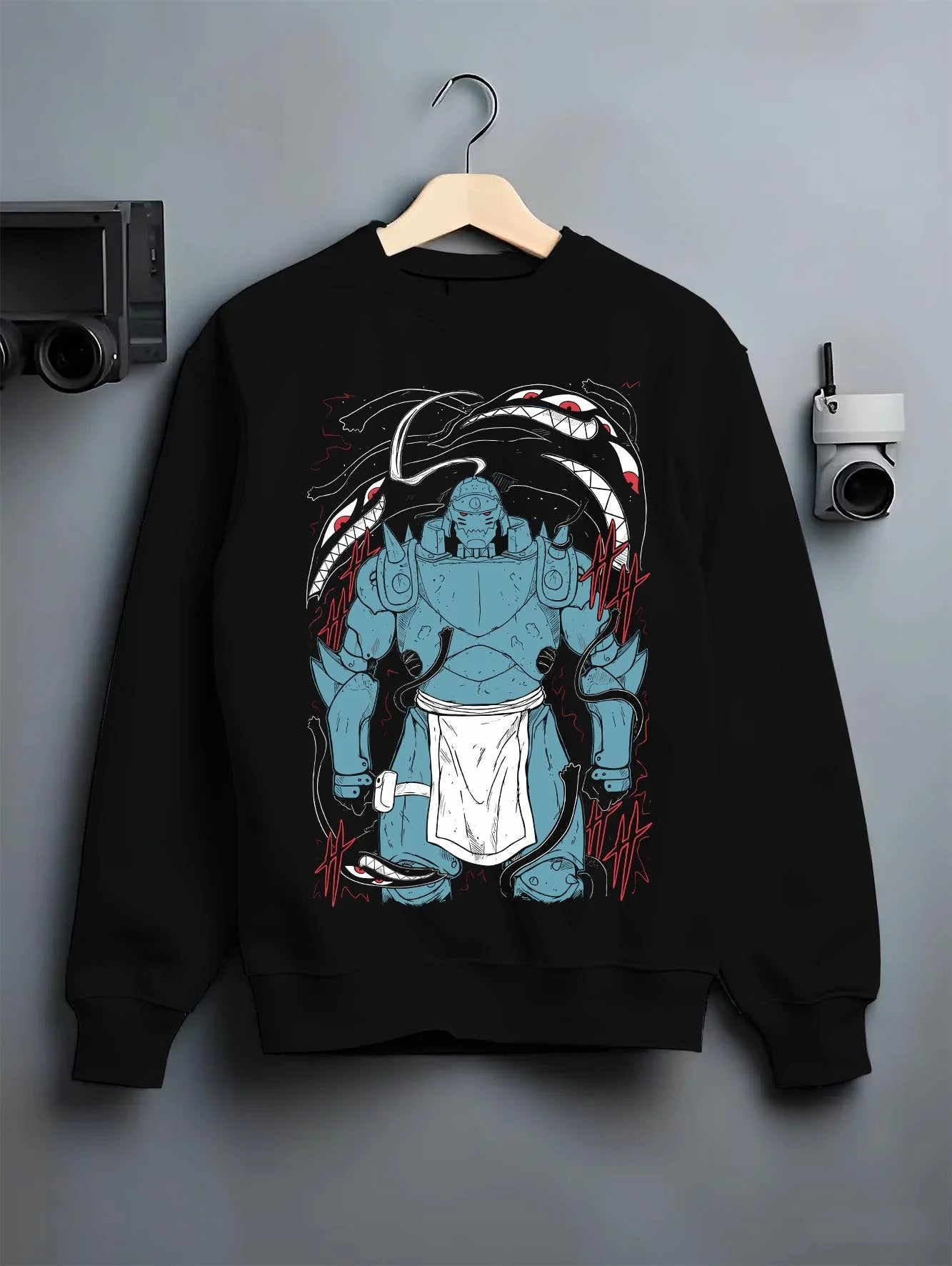 Black crewneck sweatshirt on hanger with Alphonse Hoodie Fullmetal Alchemist Steel Armoured Form graphic streetwear graphic.