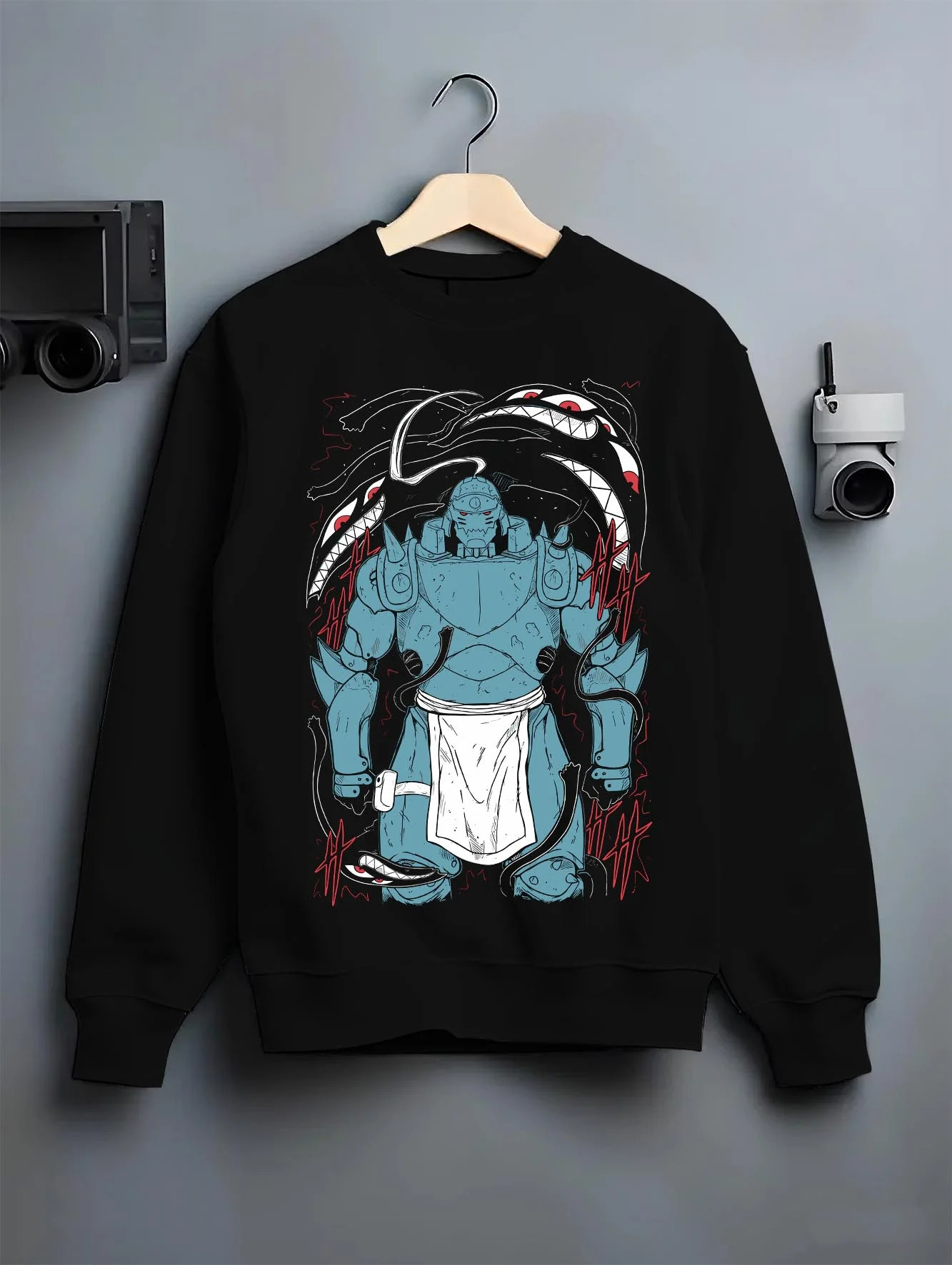 Black crewneck sweatshirt on hanger with Alphonse Hoodie Fullmetal Alchemist Steel Armoured Form graphic streetwear graphic.