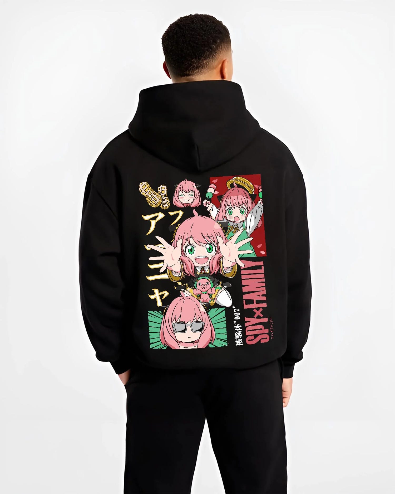 Black hoodie worn by male model, back view with Anya Forger Hoodie Spy x Family Cute Panel Collection graphic premium wear.