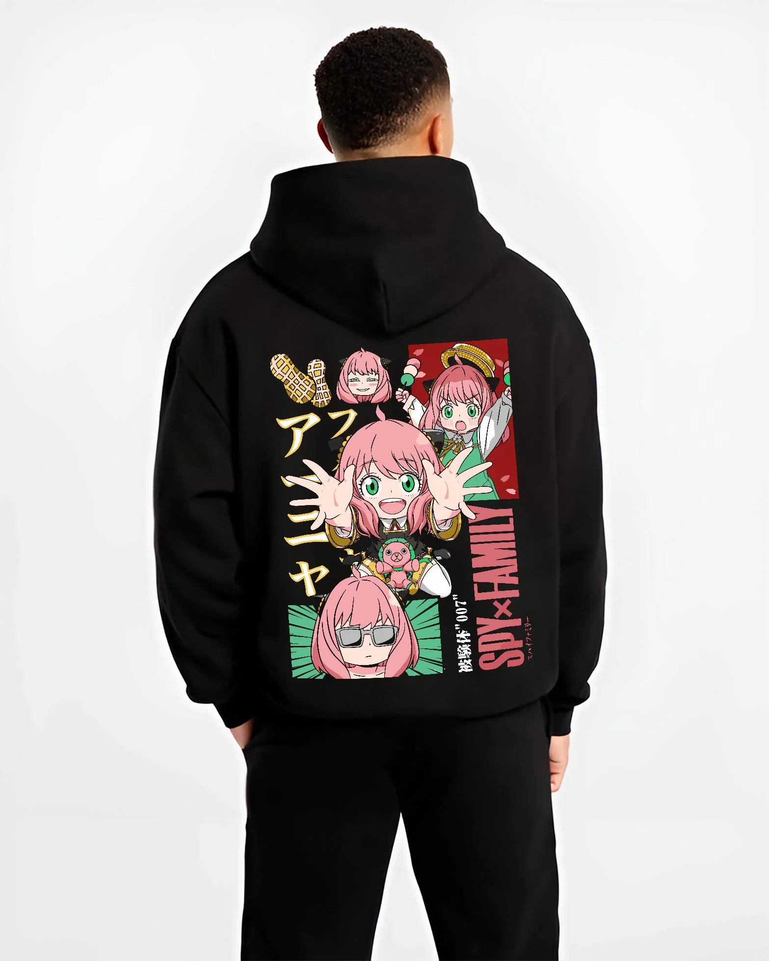 Black hoodie worn by male model, back view with Anya Forger Hoodie Spy x Family Cute Panel Collection graphic premium wear.