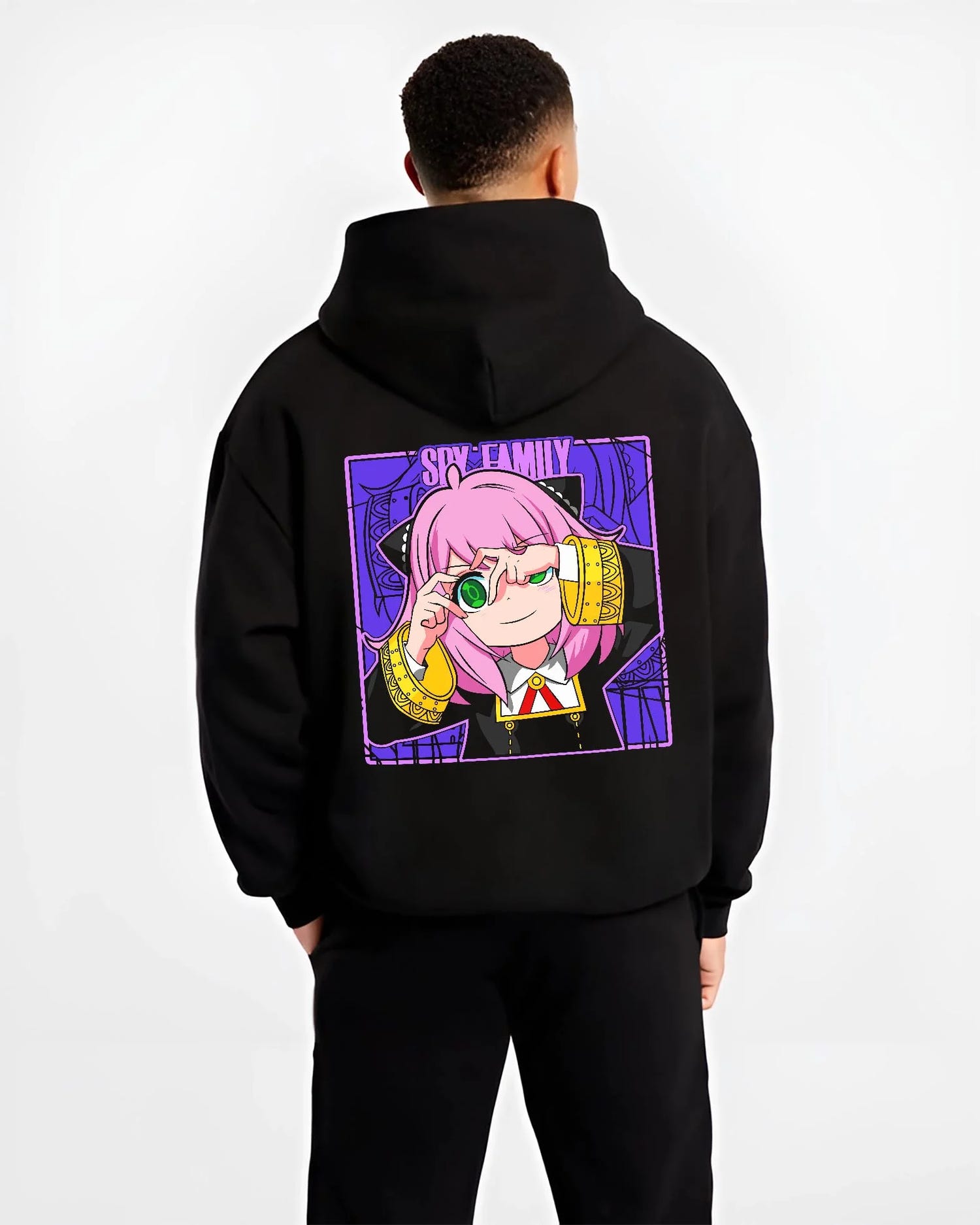 Black hoodie worn by male model, back view with Anya Forger Hoodie Spy x Family Magnifying Glass Scene graphic bold anime graphic.