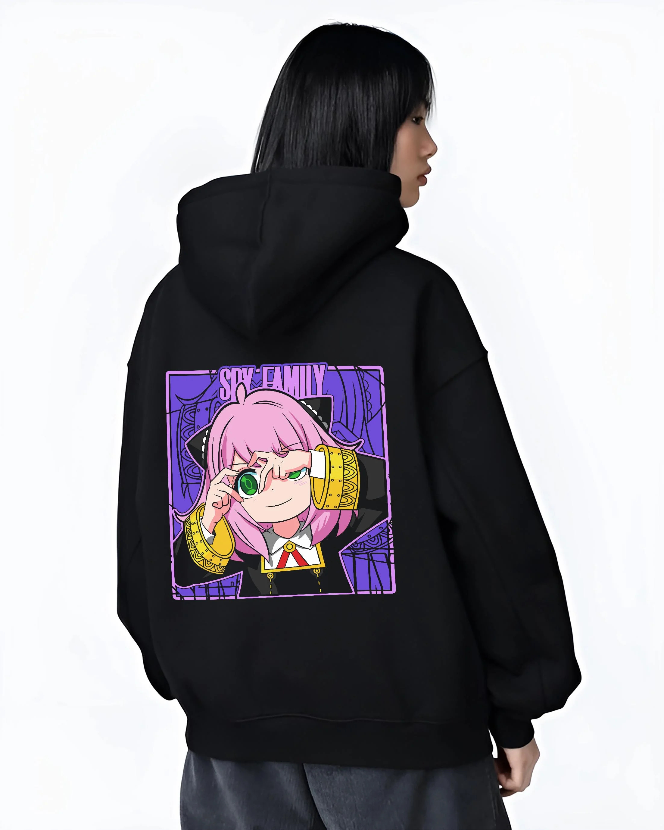 Black hoodie worn by female model, back view with Anya Forger Hoodie Spy x Family Magnifying Glass Scene graphic bold anime graphic.
