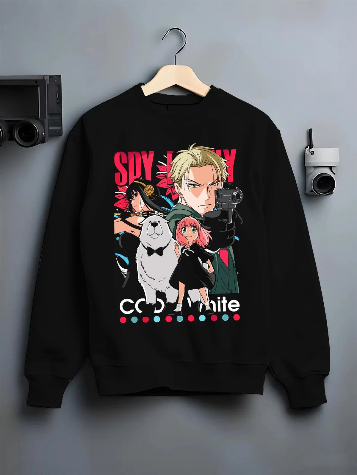 Black crewneck sweatshirt on hanger featuring Anya Forger Spy x Family family mission artwork.