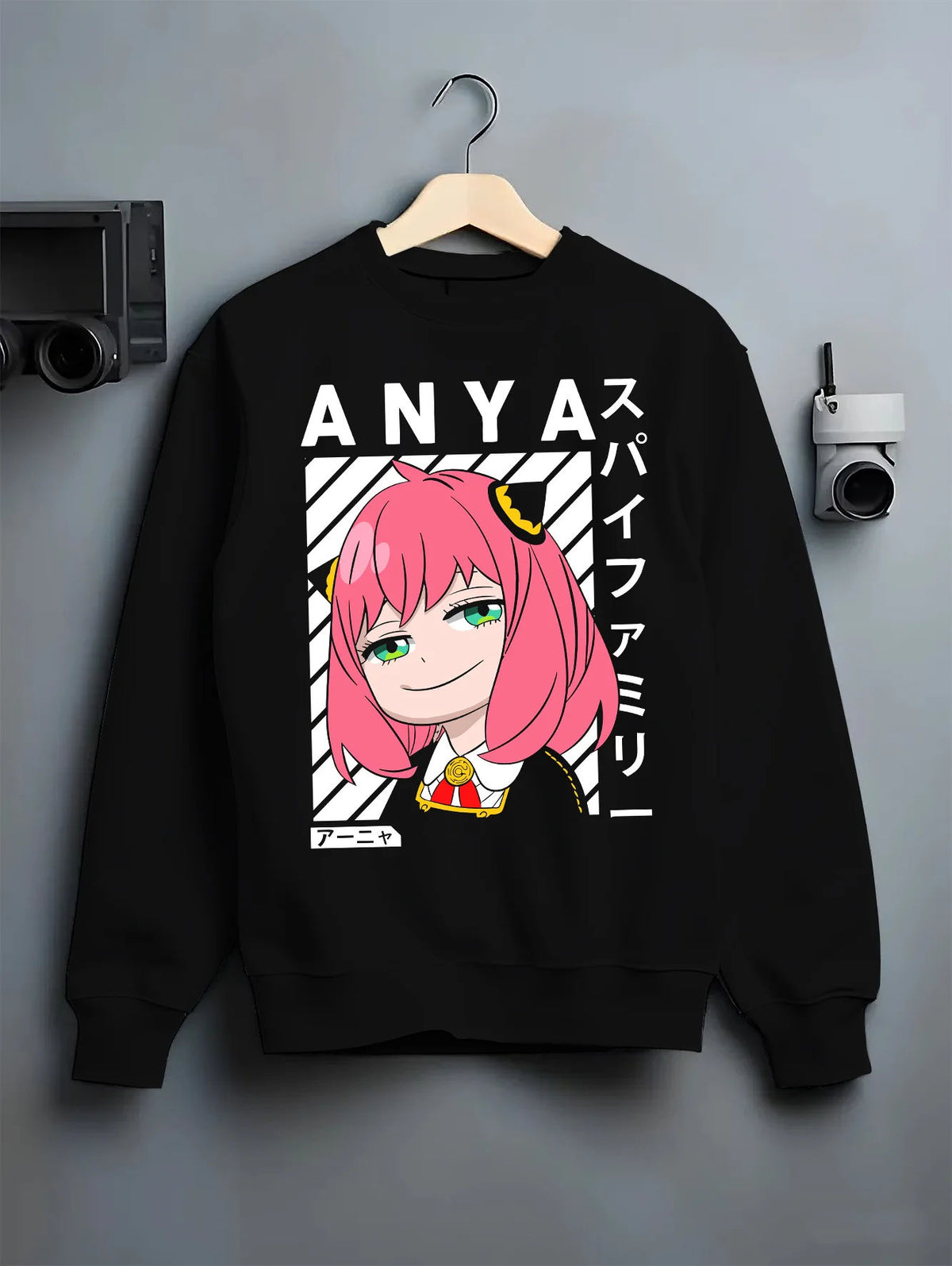 Black crewneck sweatshirt on hanger showing Anya Forger from Spy x Family: Spy x Family pink-haired portrait