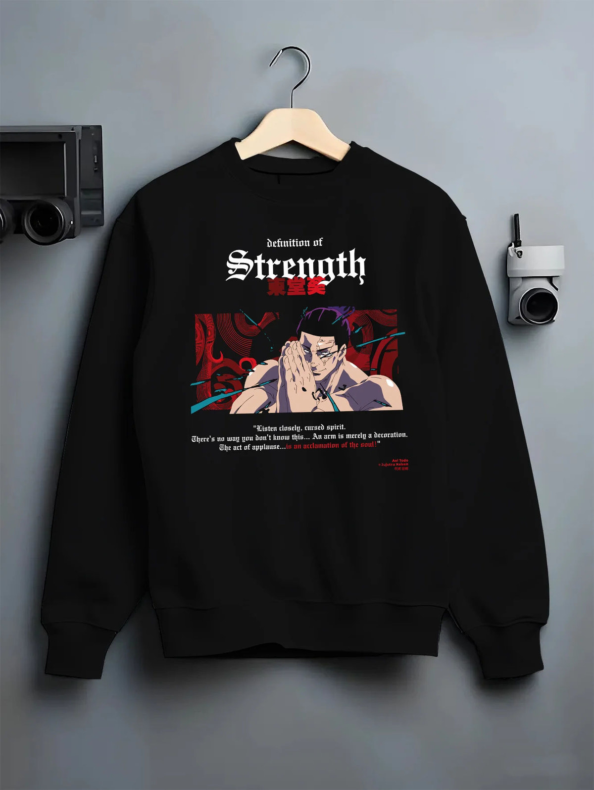 Black crewneck sweatshirt on hanger showing Aoi Todo from Jujutsu Kaisen: definition of strength and prayer pose
