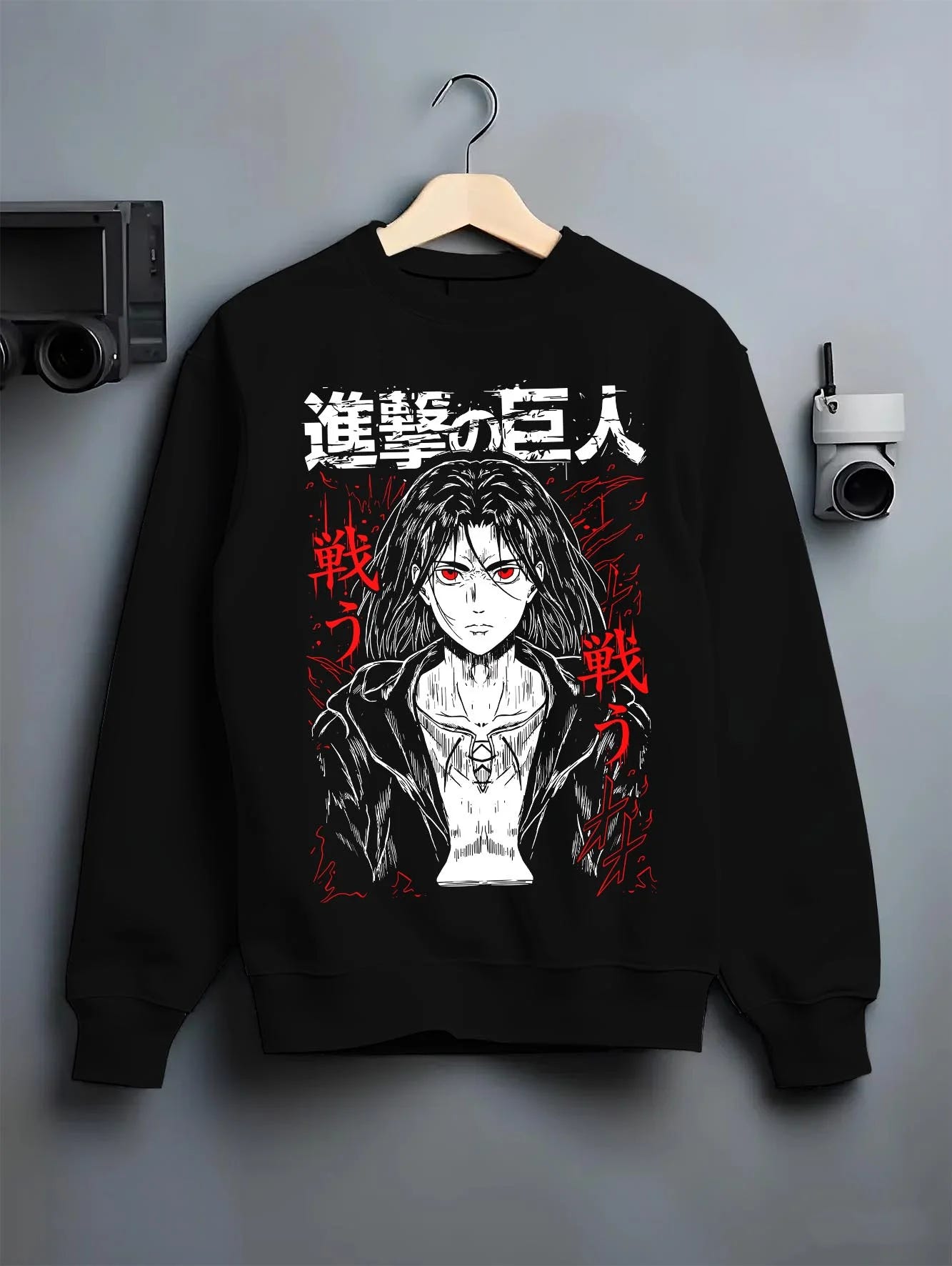 Black crewneck sweatshirt on hanger with Eren Yeager Hoodie Attack on Titan War Cry Panel Print graphic premium wear.