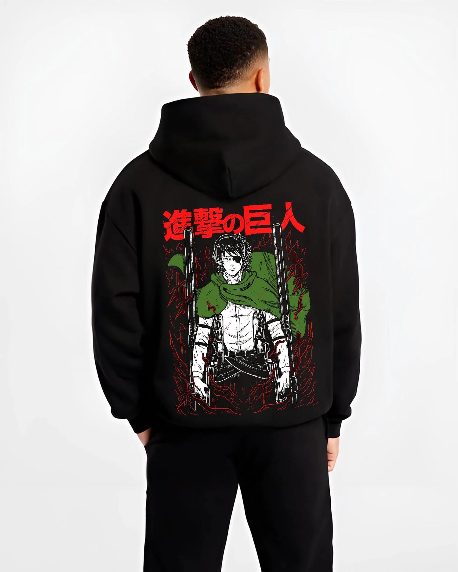 Black hoodie worn by male model, back view with Levi Ackerman Hoodie Attack on Titan Captain Blade Pose graphic premium wear.