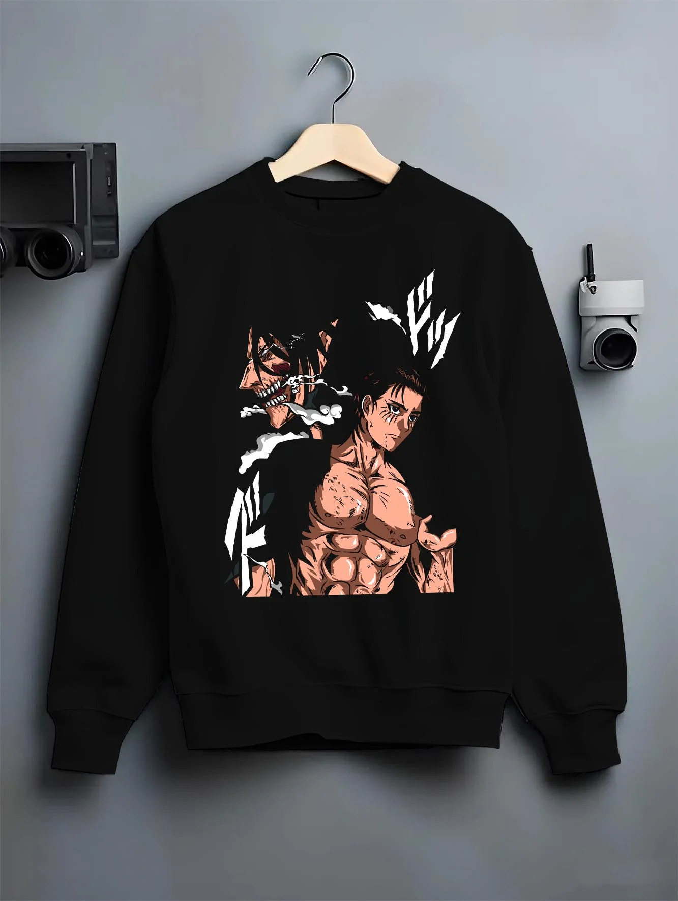 Black crewneck sweatshirt on hanger with Eren Yeager Hoodie Attack on Titan Shifter Titan Power graphic premium wear.