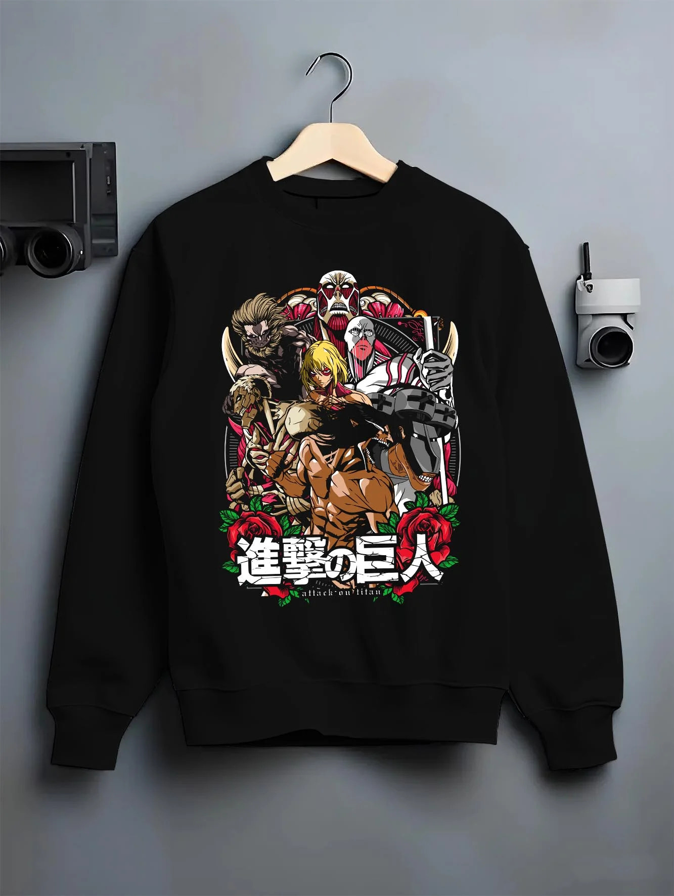 Black crewneck sweatshirt on hanger with Titan War Hoodie Attack on Titan Final Season Poster graphic bold anime graphic.