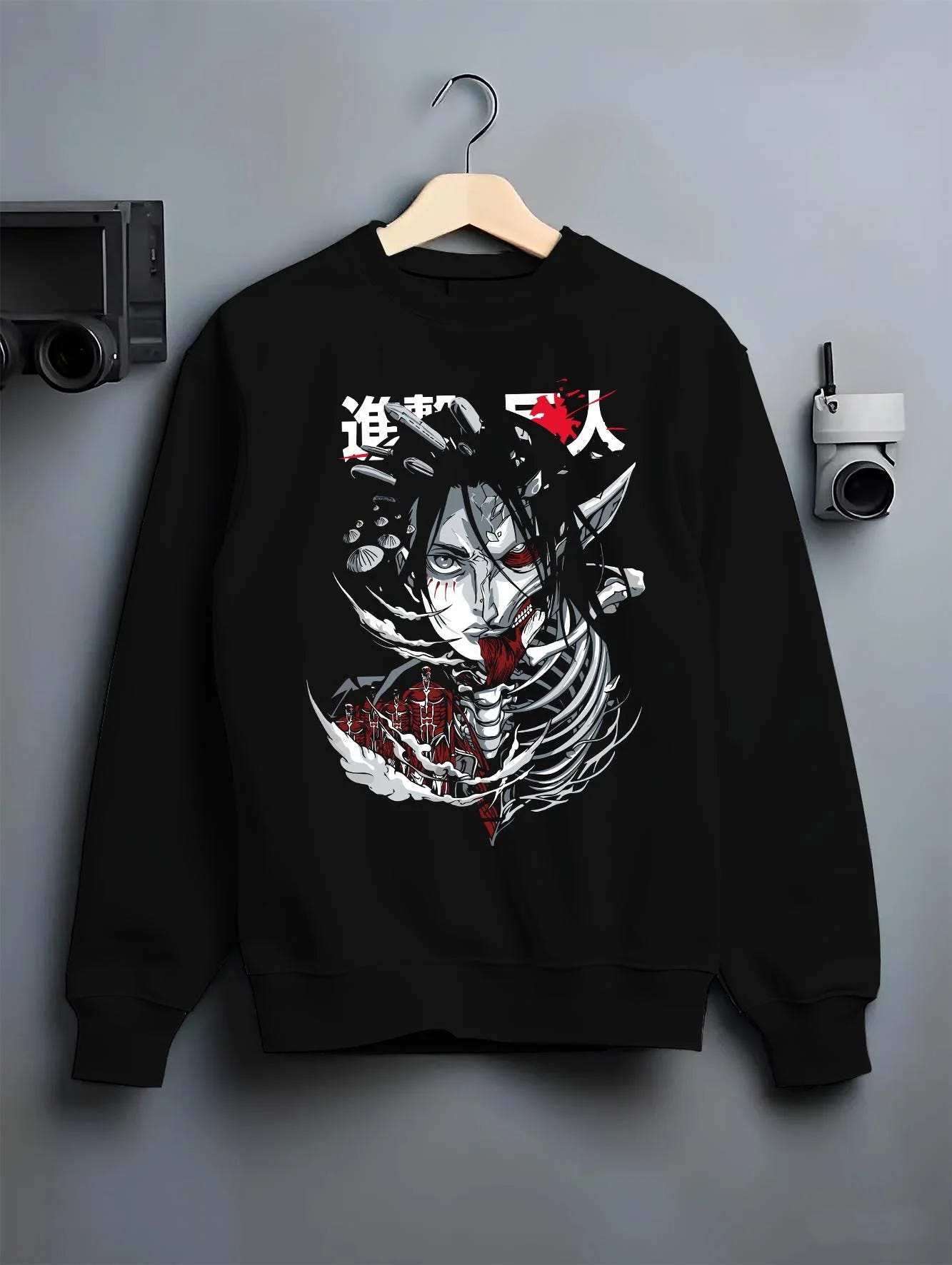 Black crewneck sweatshirt on hanger with Founding Titan Hoodie Attack on Titan Skull Face Panel graphic bold anime graphic.