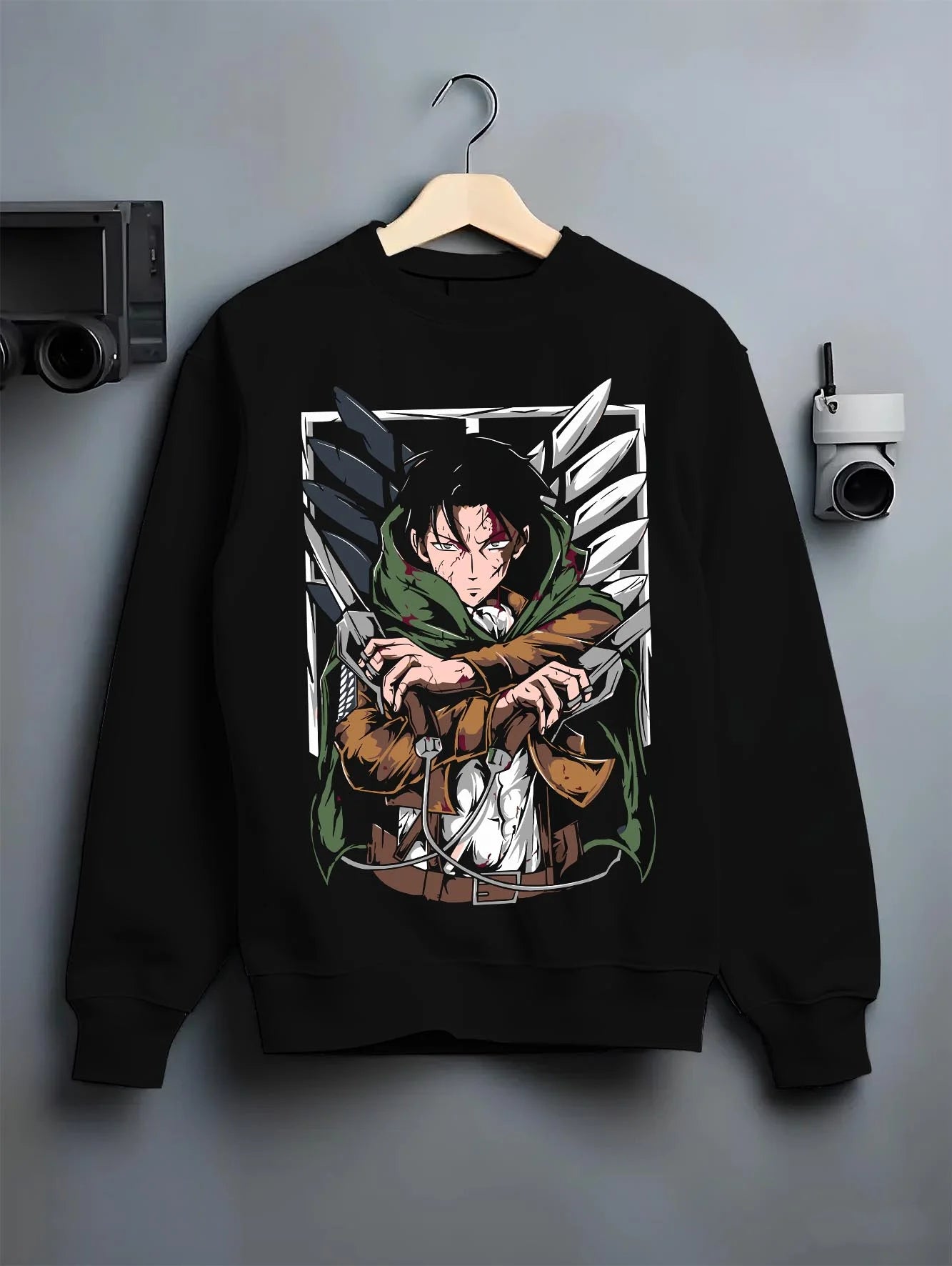 Black crewneck sweatshirt on hanger with Levi Ackerman Hoodie Attack on Titan Green Cloak Battle graphic streetwear graphic.