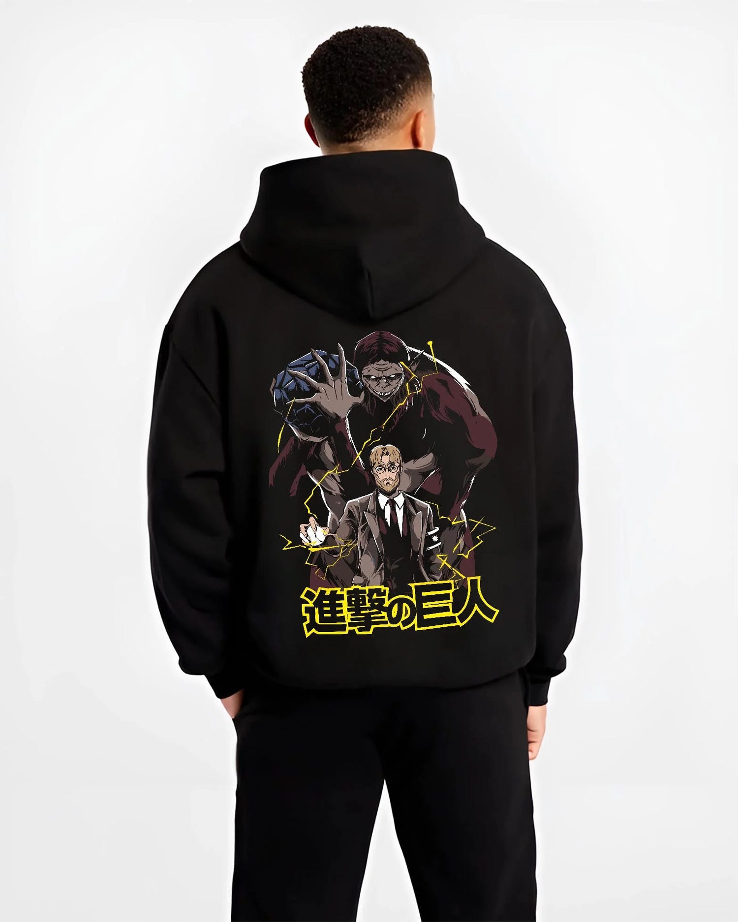 Black hoodie worn by male model, back view with Zeke Yeager Hoodie Attack on Titan Beast Titan Control graphic bold anime graphic.
