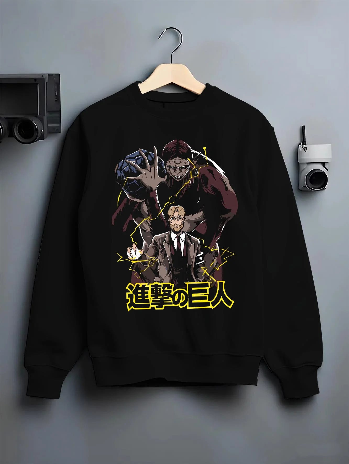 Black crewneck sweatshirt on hanger with Zeke Yeager Hoodie Attack on Titan Beast Titan Control graphic streetwear graphic.