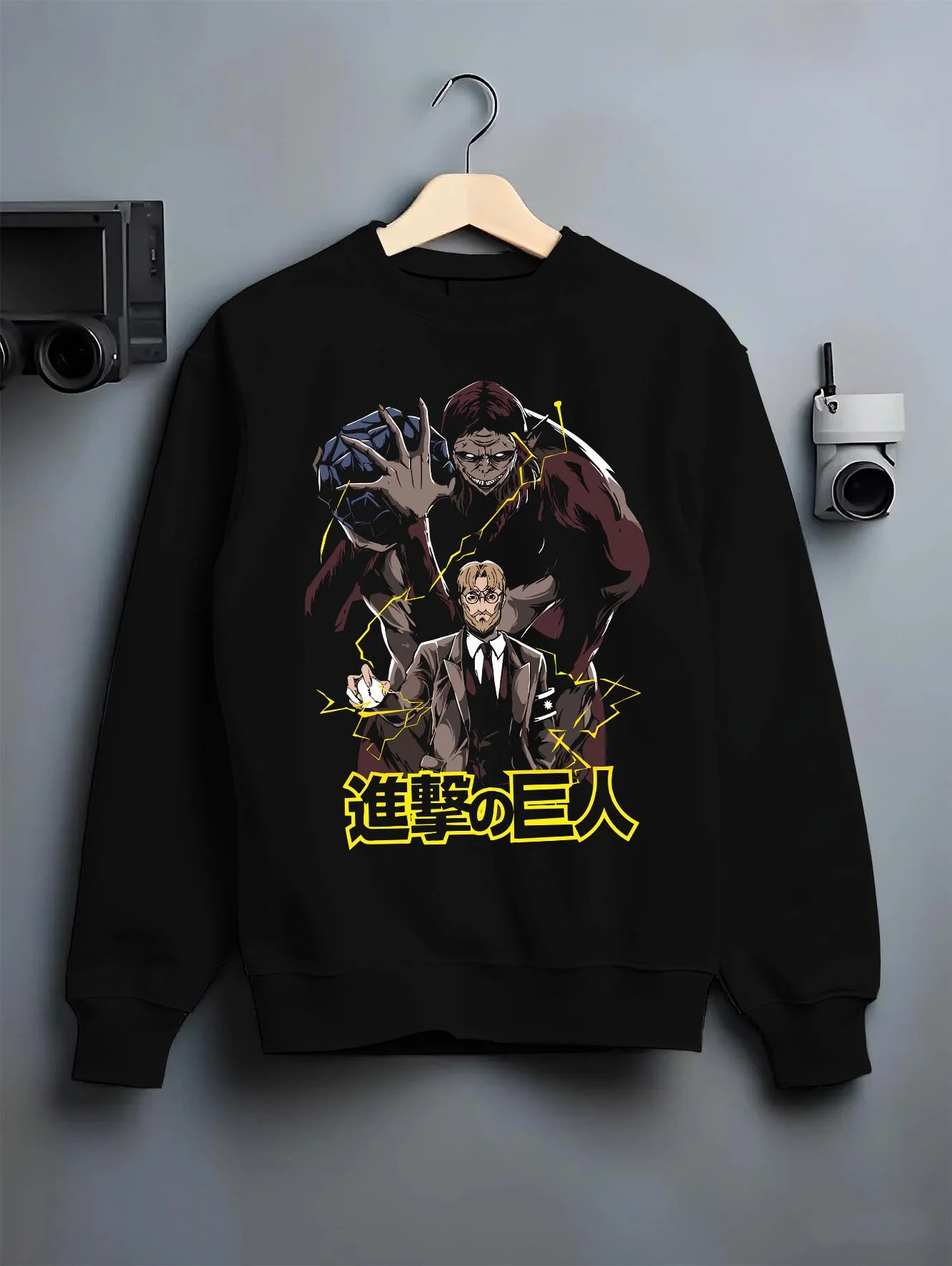 Black crewneck sweatshirt on hanger with Zeke Yeager Hoodie Attack on Titan Beast Titan Control graphic streetwear graphic.