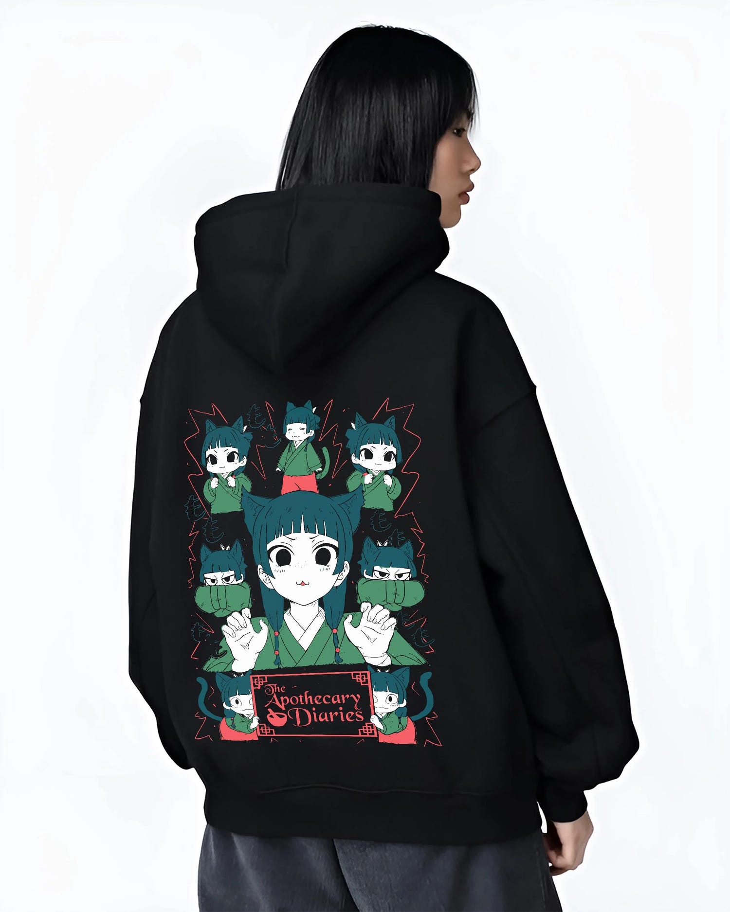 Black hoodie worn by female model, back view with Apothecary Diaries Hoodie Maomao Green Poison Dolls graphic streetwear graphic.