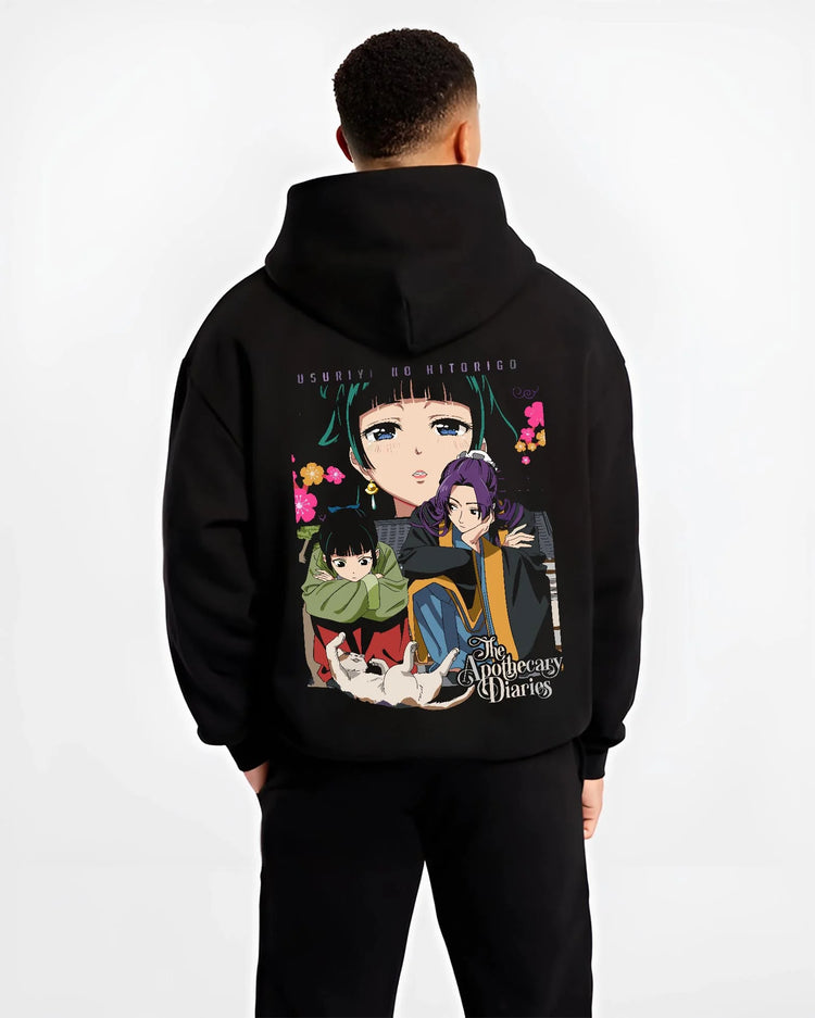 Black hoodie worn by male model, back view with Apothecary Diaries Hoodie Jinshi and Maomao Duo Scene graphic premium wear.