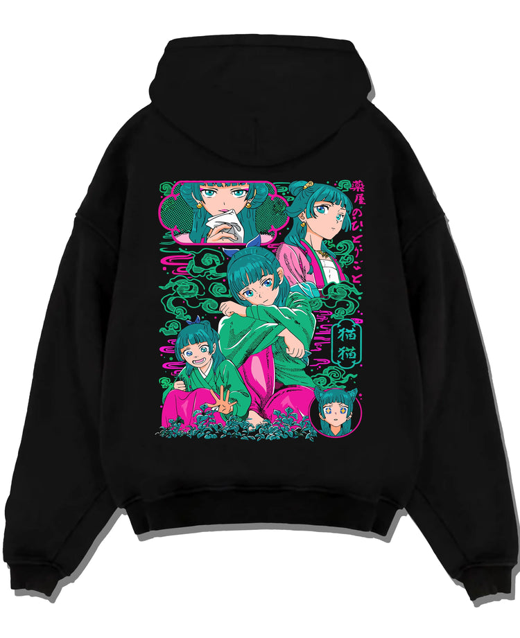 Black pullover hoodie laid flat with Apothecary Diaries Hoodie Maomao Pink Hair Trio Panel graphic Maomao anime design.