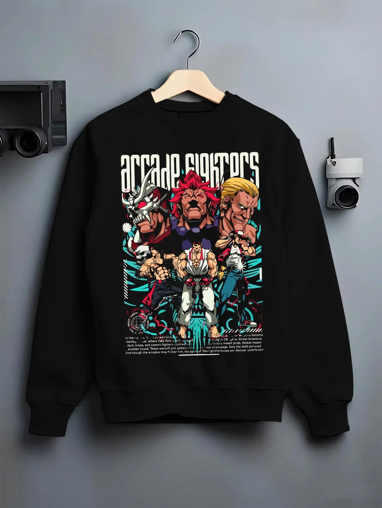 Black crewneck sweatshirt on hanger with Arcade Legends Fighter Hoodie Street Fighter Fatal Fury graphic streetwear graphic.