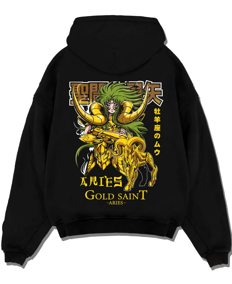 Black hoodie laid flat featuring Aries Mu Saint Seiya Gold Cloth cosmic artwork with bold anime graphic print.