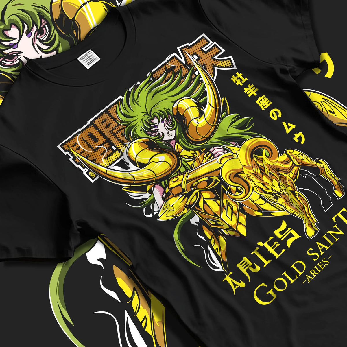 Black T-shirt laid flat with natural folds featuring Aries Mu Saint Seiya Gold Cloth cosmic artwork.