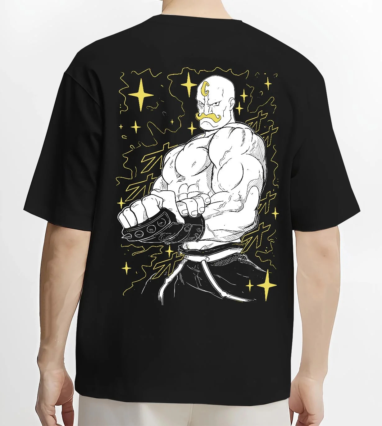 Black T-shirt worn by male model, back view with Armstrong Hoodie Fullmetal Alchemist Strongman Alchemy graphic premium wear.