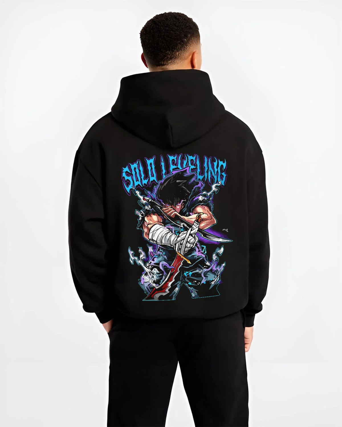 Black hoodie worn by male model from the back featuring Amestris Army Fullmetal Alchemist power artwork.