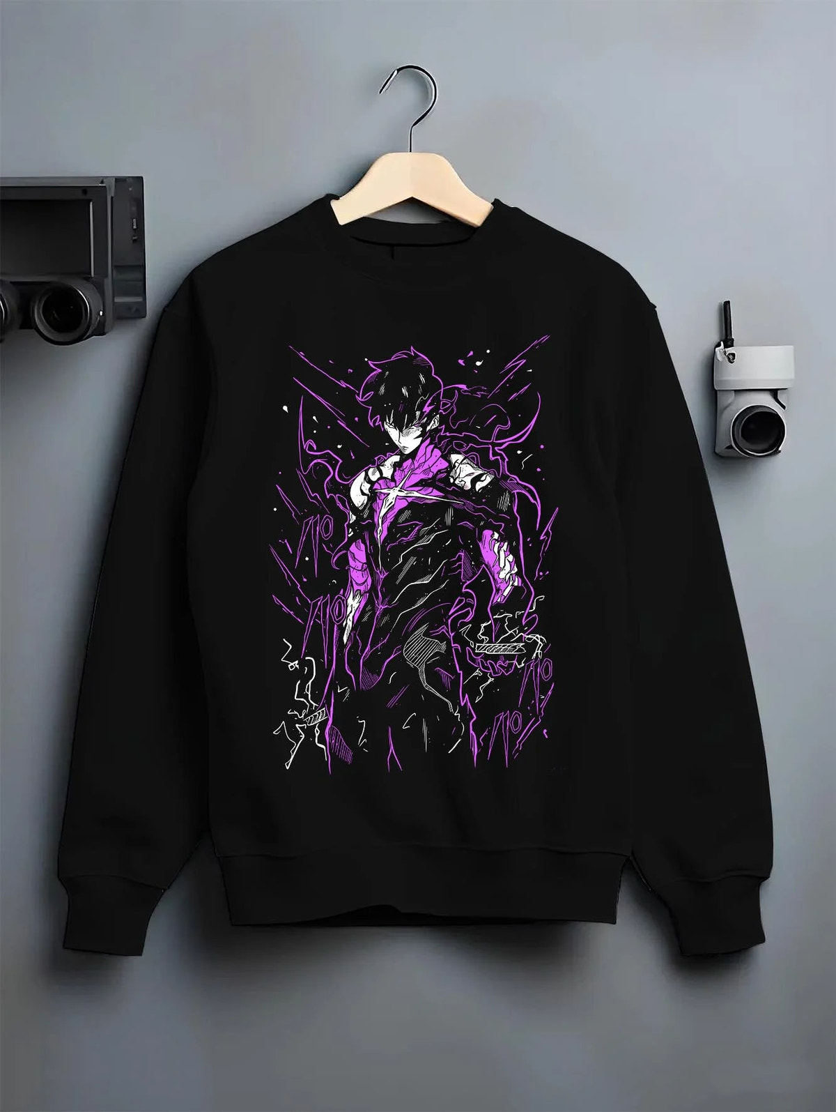 Black crewneck sweatshirt on hanger featuring Fullmetal Alchemist alchemy power dark artwork.