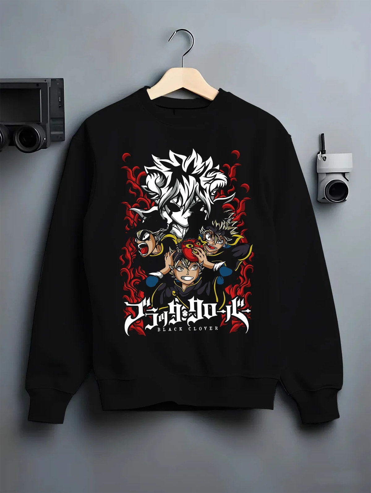Black crewneck sweatshirt on hanger with Asta and Black Clover cast illustrated back graphic