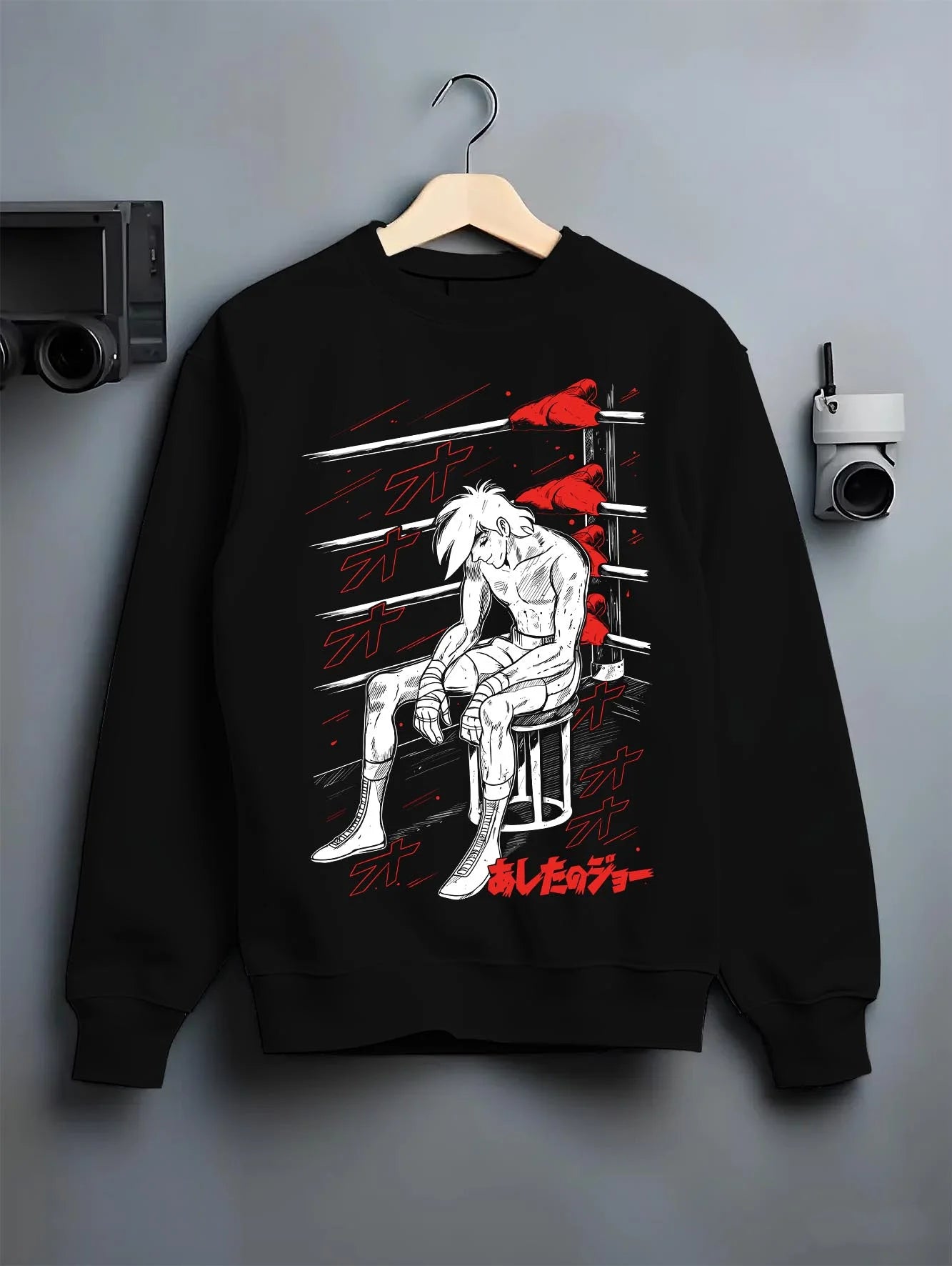 Black crewneck sweatshirt on hanger with Shiro Hoodie Great Pretender Retro Anime Chair Scene graphic premium wear.