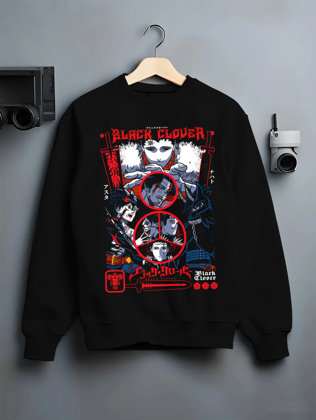 Black crewneck sweatshirt on hanger showing Black Clover: Asta/Yuno/Noelle composition