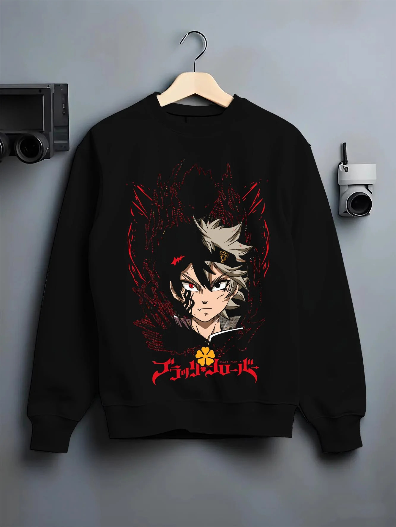 Black crewneck sweatshirt on hanger with Asta Demon Mark Hoodie Black Clover Cursed Form Print graphic Asta themed artwork.
