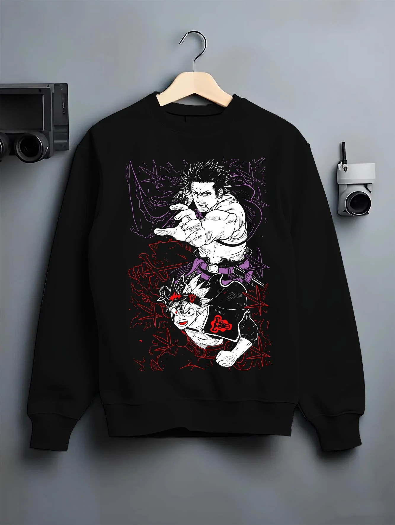 Black crewneck sweatshirt on hanger with Asta Dark Grimoire Hoodie Black Clover Inferno Power graphic streetwear graphic.